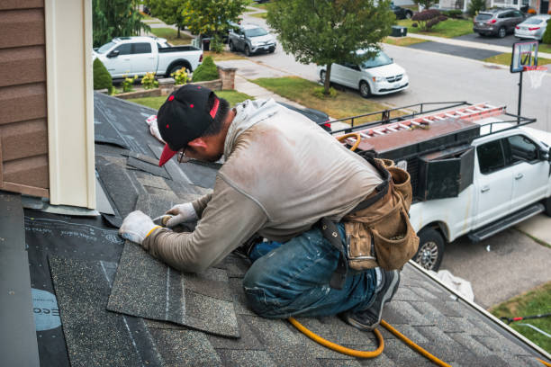 Professional Emergency Roof Repair technician working in Fenton, MI